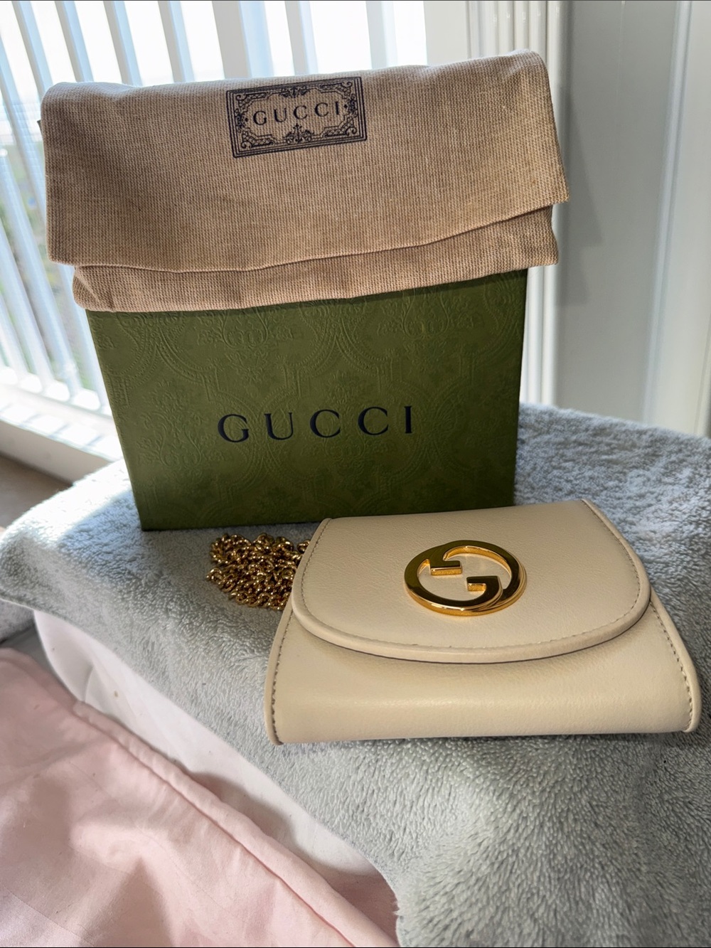 NWOT- Gucci Cream Mini Chain Wallet with Gold GG. It’s absolutely beautiful!!